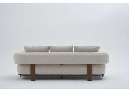 2-Sitzer Sofa mit sichtbar aufgebauter Polsterung in hellbeigem Stoff – Ahié