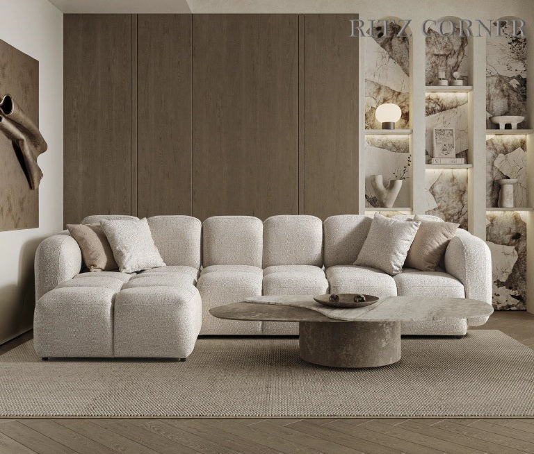 Sofa mit präzise gefasster Polsterkante – Ahié