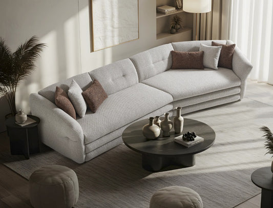 Sofa mit weich aufgebauschtem Polstervolumen