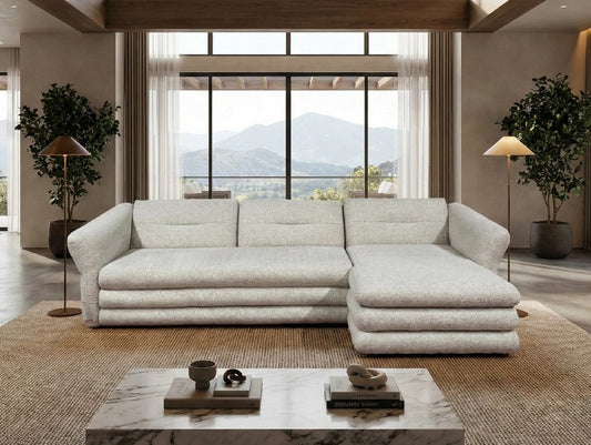 Sofa mit sichtbar aufgebauter Polsterung